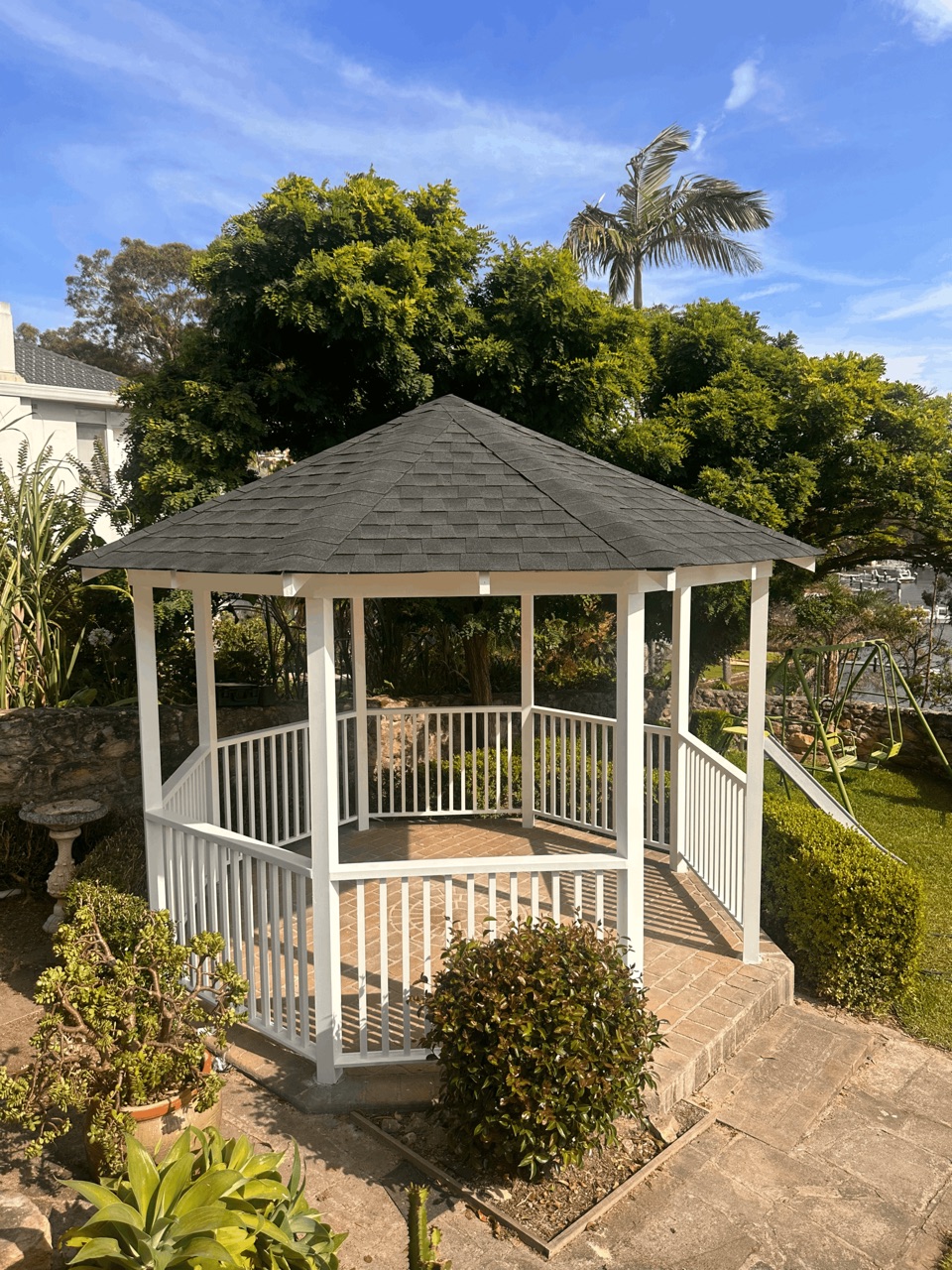 Multisided Colorbond gazebo in a garden